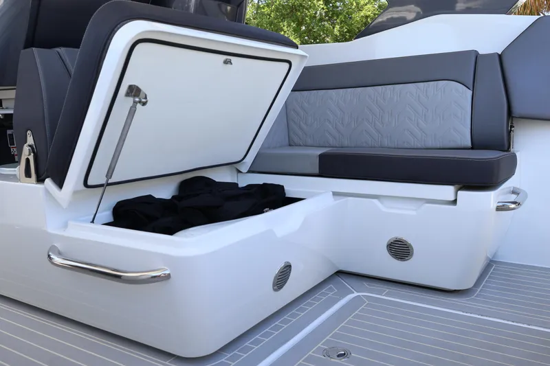 Slide: The Image of Luxurious seating on the 2024 Galeon 325 GTO yacht, featuring sleek gray upholstery. - 18