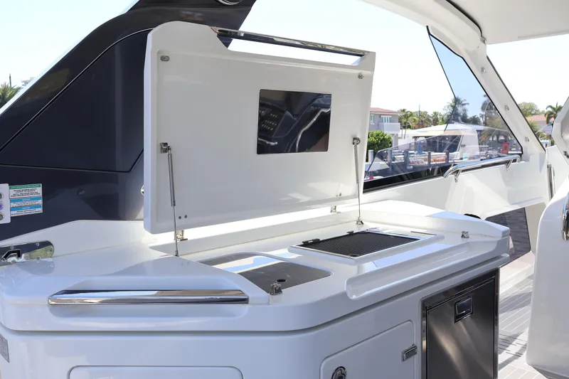 Slide: The Image of 2024 Galeon 325 GTO balcony control panel with safety instructions and notices. - 23