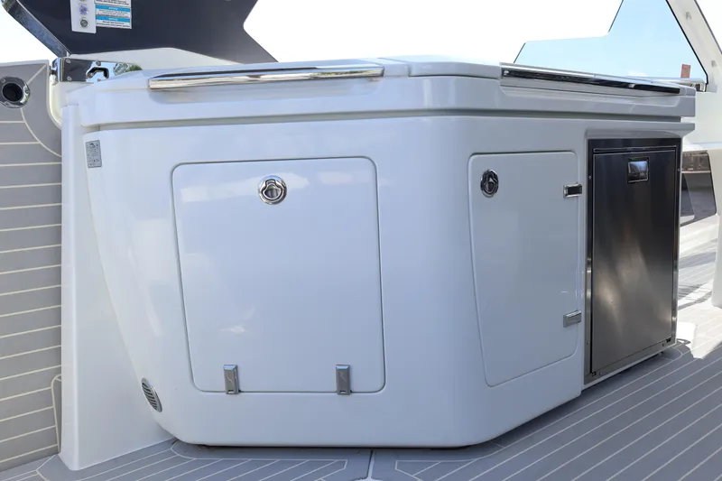 Slide: The Image of 2024 Galeon 325 GTO yacht with outdoor kitchen and grill setup. - 27