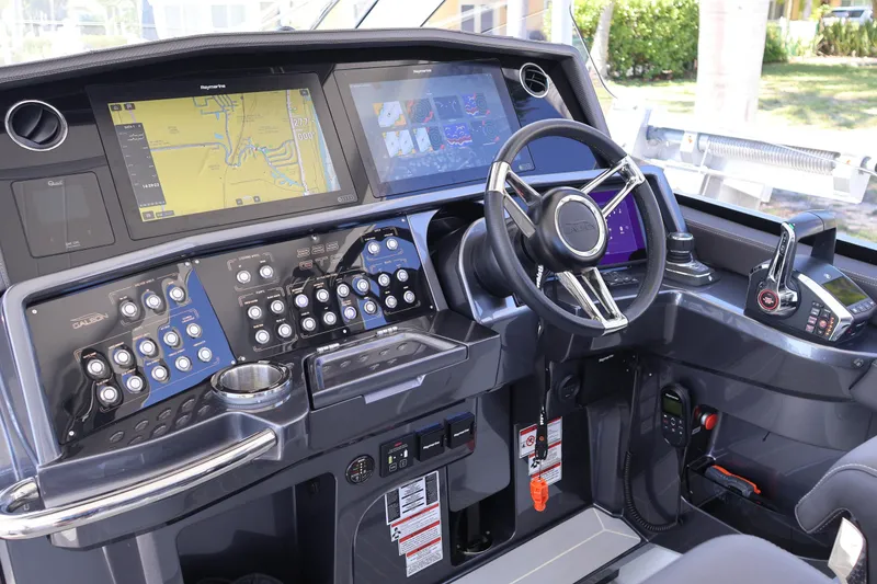 Slide: The Image of 2024 Galeon 325 GTO helm with advanced navigation and control systems. - 32