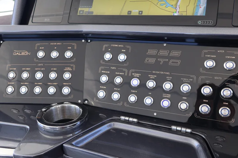 Slide: The Image of 2024 Galeon 325 GTO helm with advanced navigation and control systems. - 33