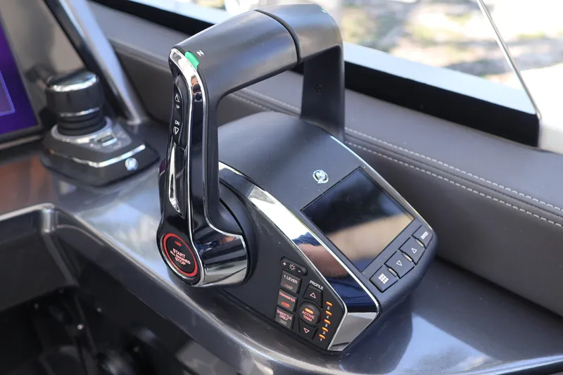 Slide: The Image of 2024 Galeon 325 GTO dashboard with digital display and control panel. - 38