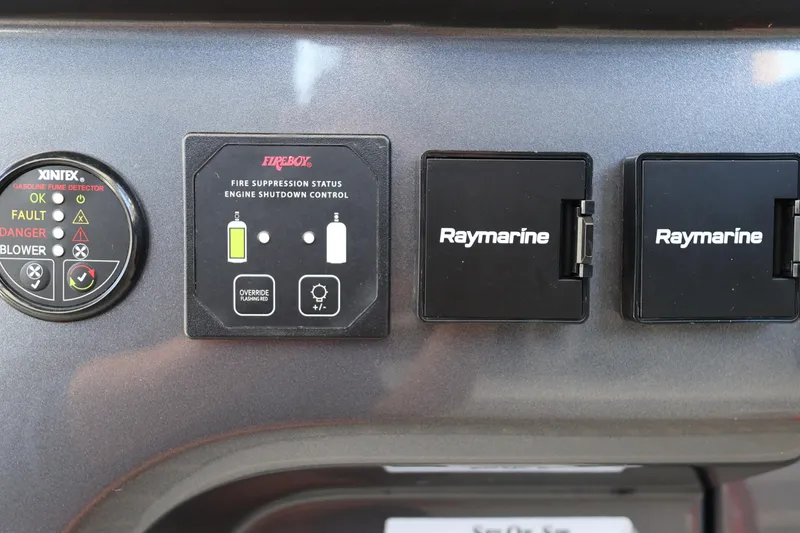 Slide: The Image of 2024 Galeon 325 GTO helm controls with joystick and digital display. - 42