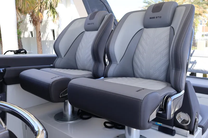 Slide: The Image of 2024 Galeon 325 GTO boat seats, featuring sleek gray and white design. - 45