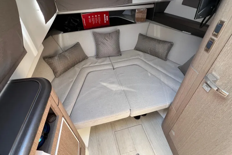 Slide: The Image of Interior of 2024 Galeon 325 GTO yacht with cozy seating and modern design. - 52