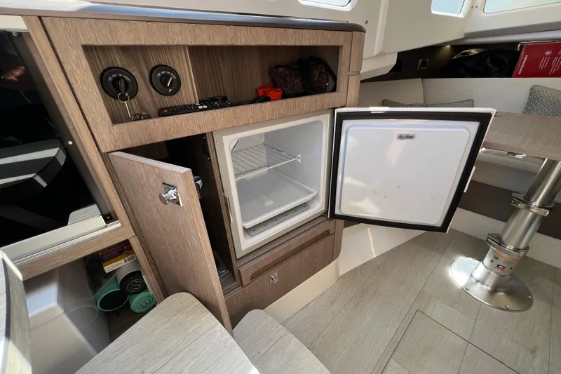 Slide: The Image of 2024 Galeon 325 GTO electrical panel with control switches and display. - 57