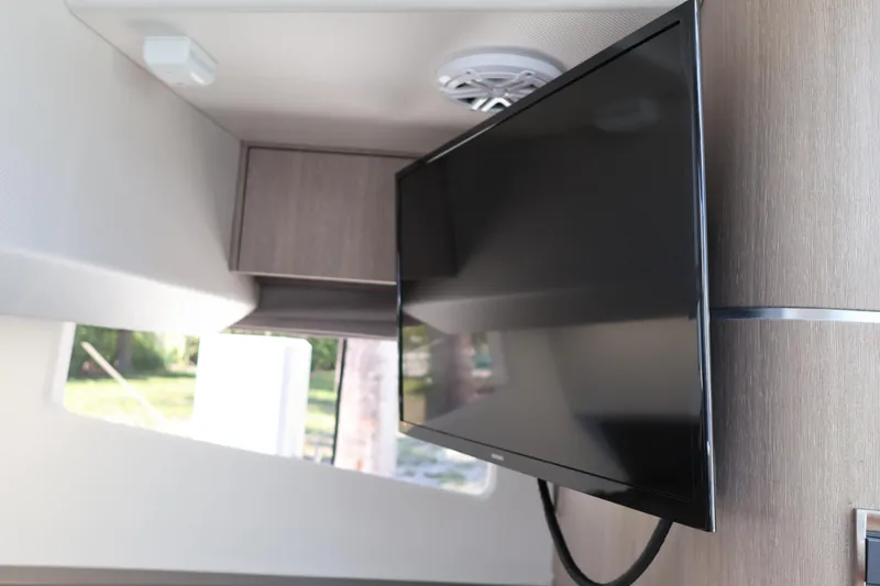 Slide: The Image of Manufacturer Provided Image: Interior of 2024 Galeon 325 GTO yacht with cozy seating and tea set. - 60