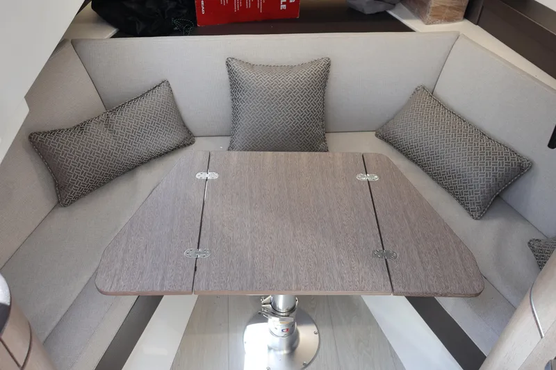 Slide: The Image of 2024 Galeon 325 GTO interior with mounted flat-screen TV and modern wood paneling. - 61