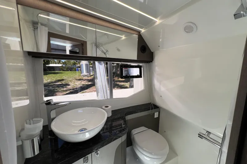 Slide: The Image of 2024 Galeon 325 GTO bathroom with modern fixtures and sleek design. - 64