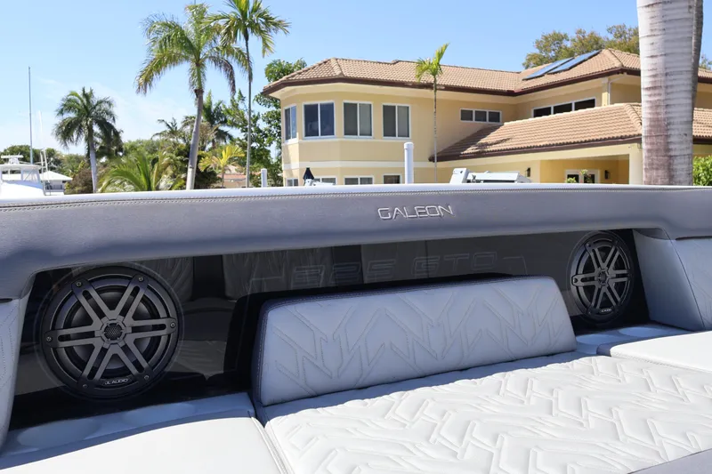 Slide: The Image of Luxurious seating area on 2024 Galeon 325 GTO boat, featuring sleek gray upholstery. - 71
