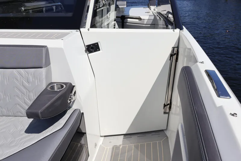 Slide: The Image of 2024 Galeon 325 GTO yacht deck with sleek design and waterfront view. - 77