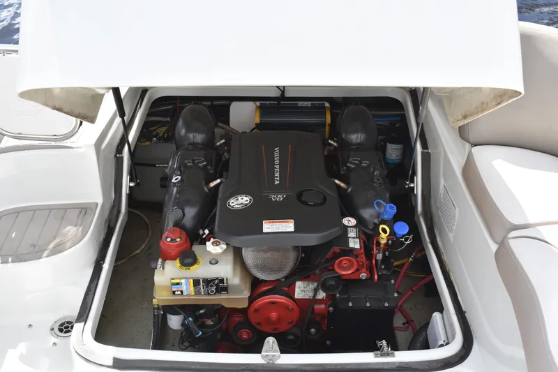 Slide: The Image of Engine compartment of 2019 Crownline Eclipse E255 SURF boat with Volvo Penta engine. - 16