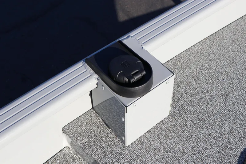 Slide: The Image of 2026 Smoker Craft Pro Sportsman 1660 boat detail, featuring a rod holder on deck. - 23