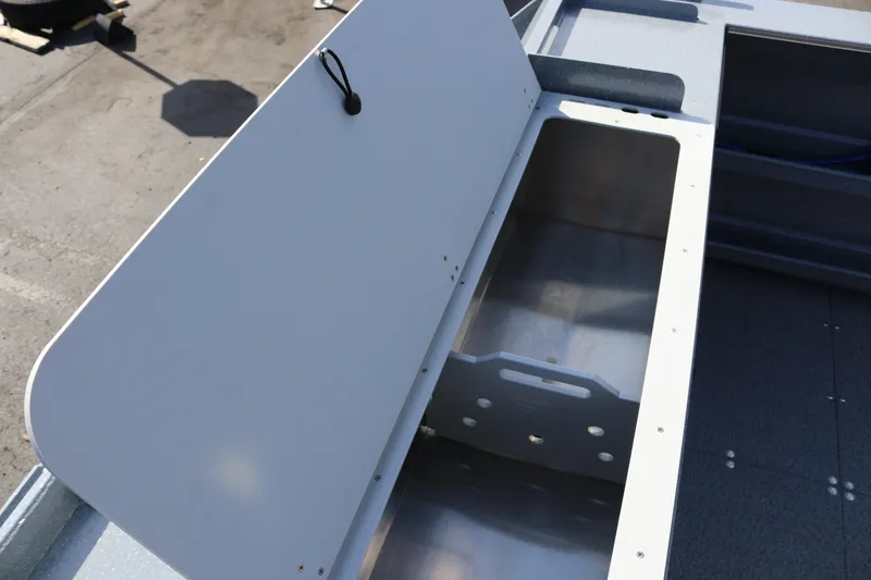 Slide: The Image of Open storage compartment on 2026 KingFisher 2825 Coastal Express boat. - 16
