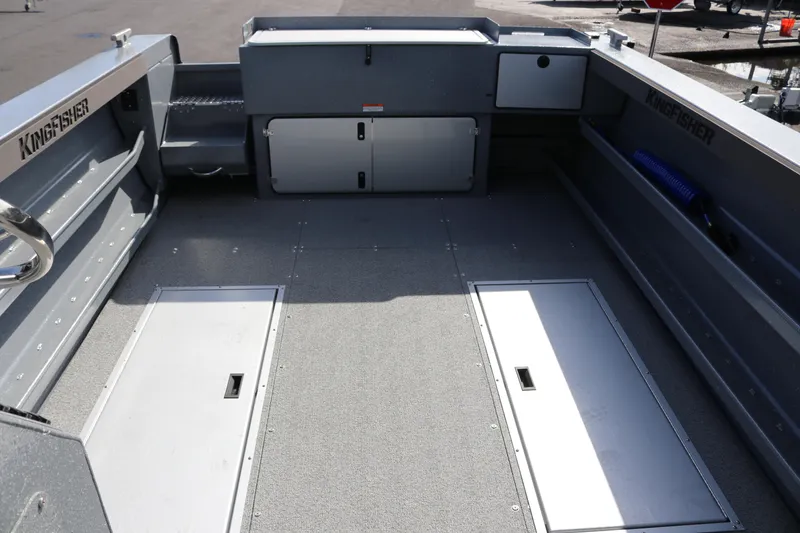 Slide: The Image of Interior view of 2026 KingFisher 2825 Coastal Express boat, showcasing spacious deck layout. - 25