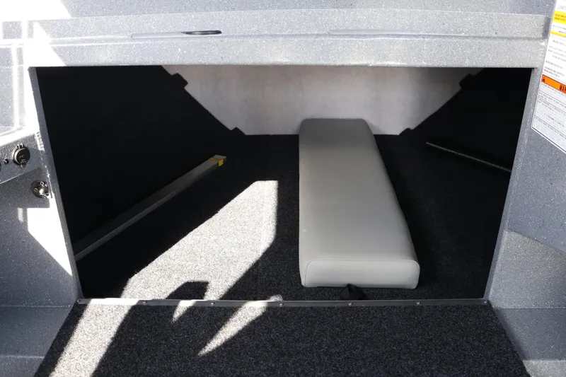 Slide: The Image of Interior cabin of 2026 KingFisher 2825 Coastal Express boat, featuring cushioned seating. - 37