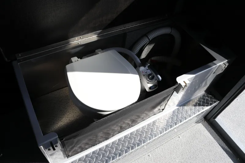 Slide: The Image of Compact marine toilet in 2026 KingFisher 2825 Coastal Express boat interior. - 38