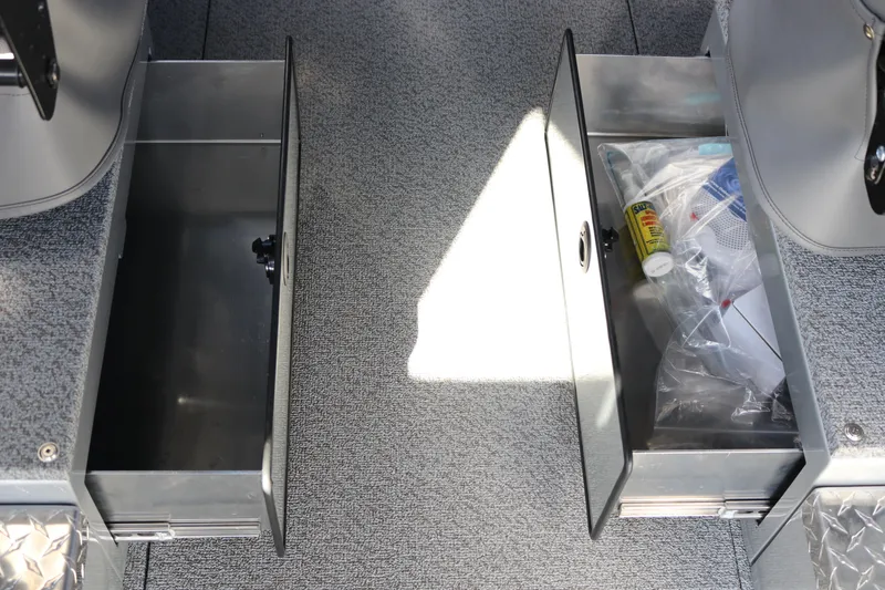 Slide: The Image of Open storage compartments on KingFisher 2825 Coastal Express boat, 2026 model. - 40