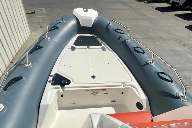 Slide: The Image of 2024 Zodiac Medline 6.8 boat deck with sleek design and sturdy railings. - 13