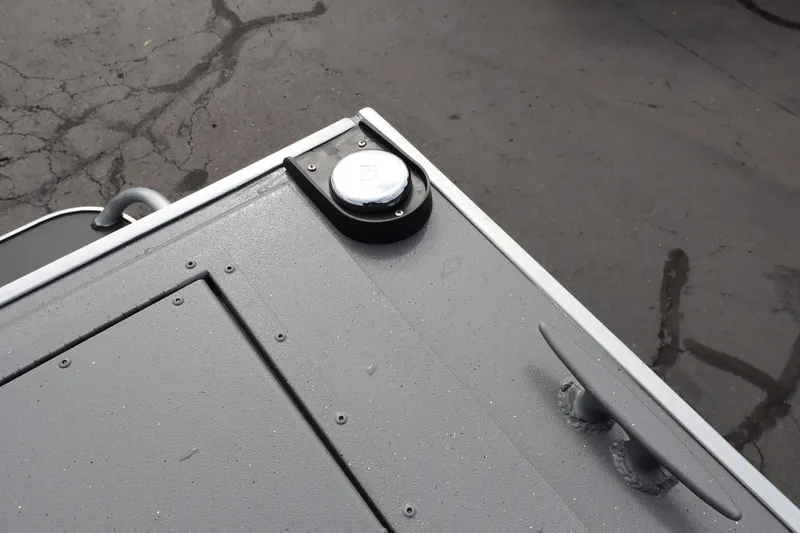 Slide: The Image of 2026 Alumaweld Intruder Outboard 20 boat deck with cleat and hatch detail. - 35