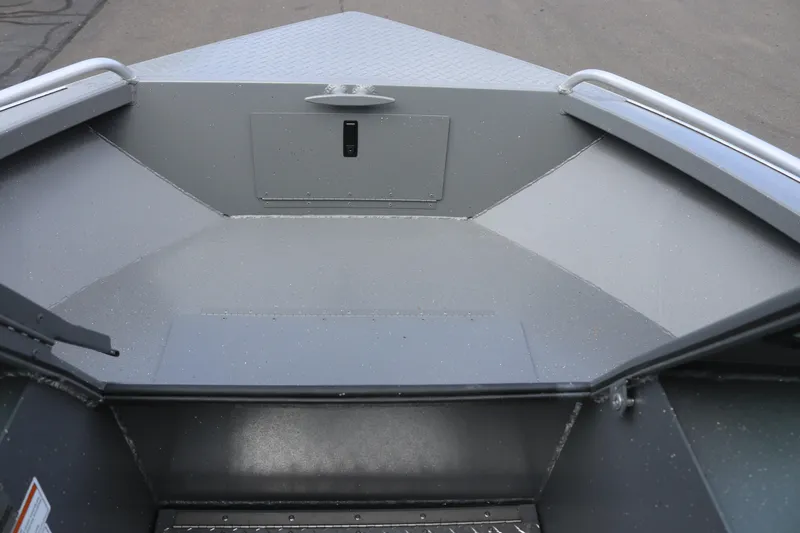 Slide: The Image of 2026 Alumaweld Intruder Outboard 20 boat interior, showcasing spacious bow area with metal finish. - 6