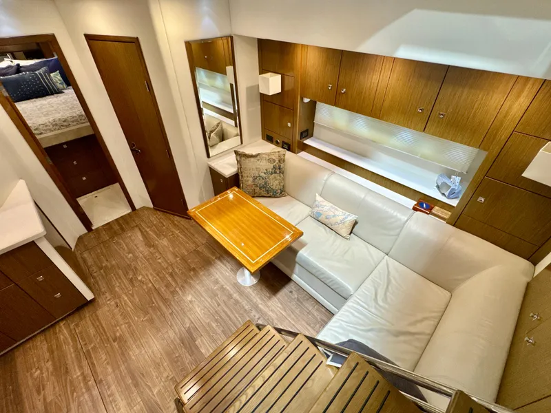 Slide: The Image of Interior of 2016 Cruisers Yachts 48 Cantius with elegant seating area. - 13