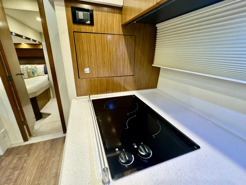 Slide: The Image of Interior of 2016 Cruisers Yachts 48 Cantius with modern kitchen. - 17