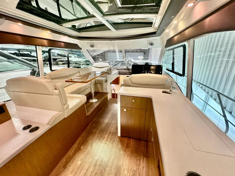 Slide: The Image of Interior of a 2016 Cruisers Yachts 48 Cantius with luxurious design. - 2
