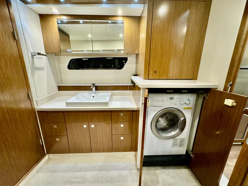 Slide: The Image of Interior of 2016 Cruisers Yachts 48 Cantius with washer and sink. - 21