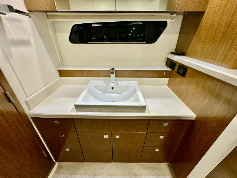 Slide: The Image of Luxurious bathroom in the 2016 Cruisers Yachts 48 Cantius model. - 23