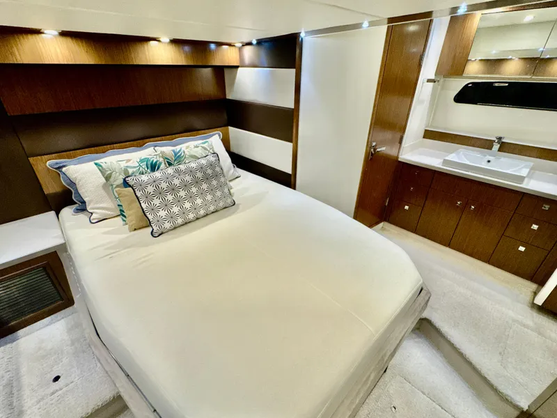 Slide: The Image of Luxurious bedroom in a 2016 Cruisers Yachts 48 Cantius. - 28