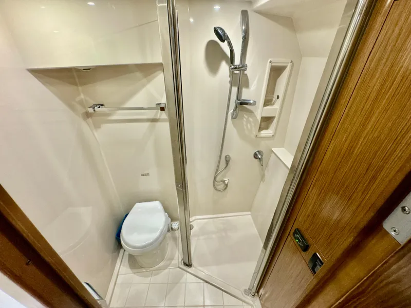 Slide: The Image of 2016 Cruisers Yachts 48 Cantius bathroom with shower and toilet. - 30