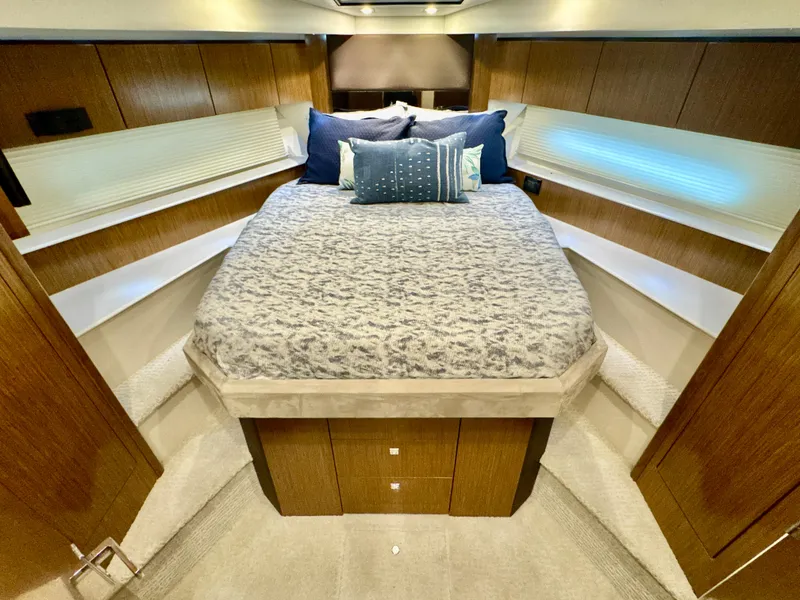 Slide: The Image of Luxurious bedroom in a 2016 Cruisers Yachts 48 Cantius. - 34