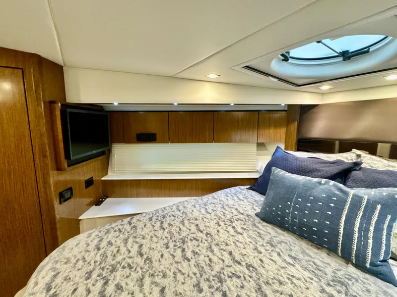 Slide: The Image of Luxurious cabin of 2016 Cruisers Yachts 48 Cantius with bed and window. - 37