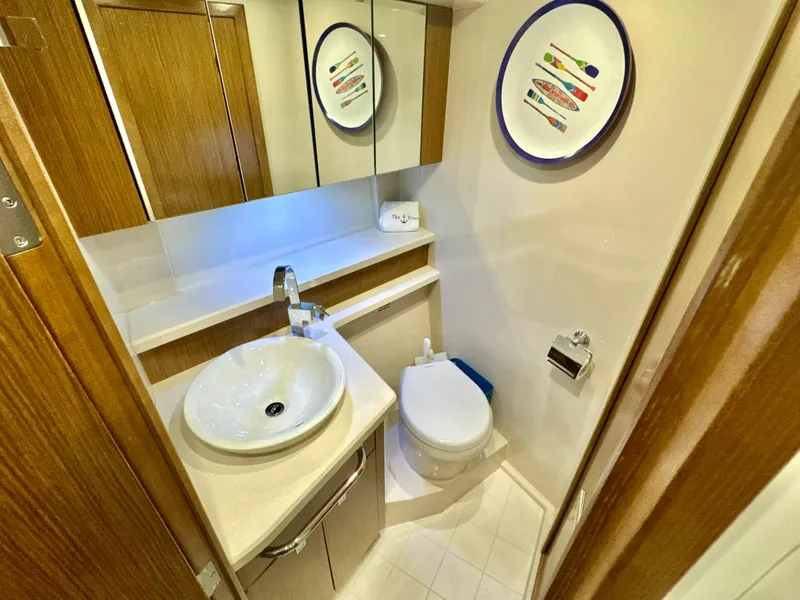 Slide: The Image of Luxurious bathroom in a 2016 Cruisers Yachts 48 Cantius. - 38