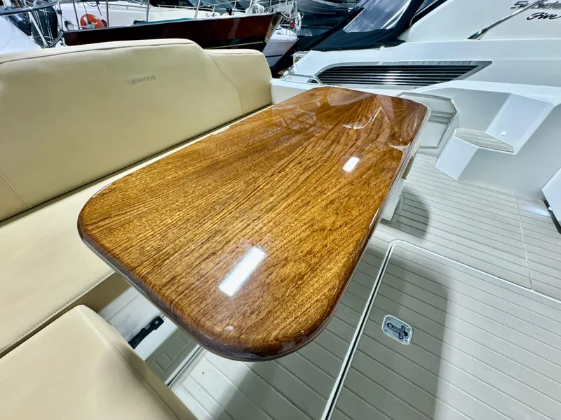 Slide: The Image of Luxurious wooden table on a 2016 Cruisers Yachts 48 Cantius. - 47