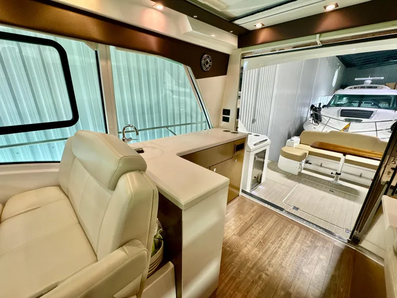 Slide: The Image of Interior of a 2016 Cruisers Yachts 48 Cantius with modern amenities. - 49