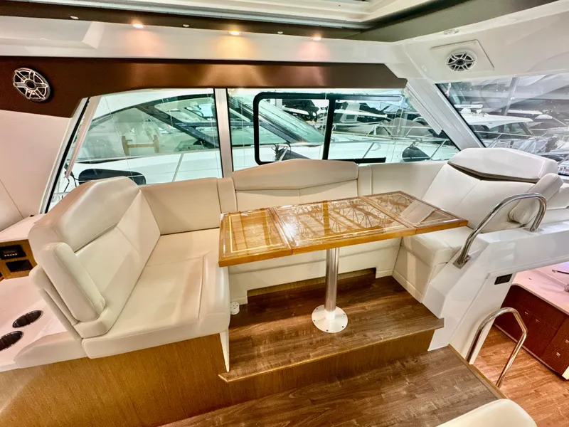 Slide: The Image of Interior of 2016 Cruisers Yachts 48 Cantius with luxurious seating area. - 5