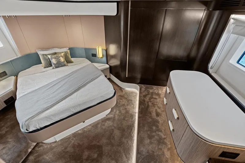 Slide: The Image of Luxurious 2019 Azimut yacht bedroom with modern design and elegant furnishings. - 27
