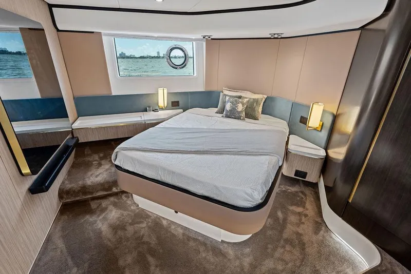 Slide: The Image of Luxurious 2019 Azimut yacht bedroom with modern design and ocean view window. - 29