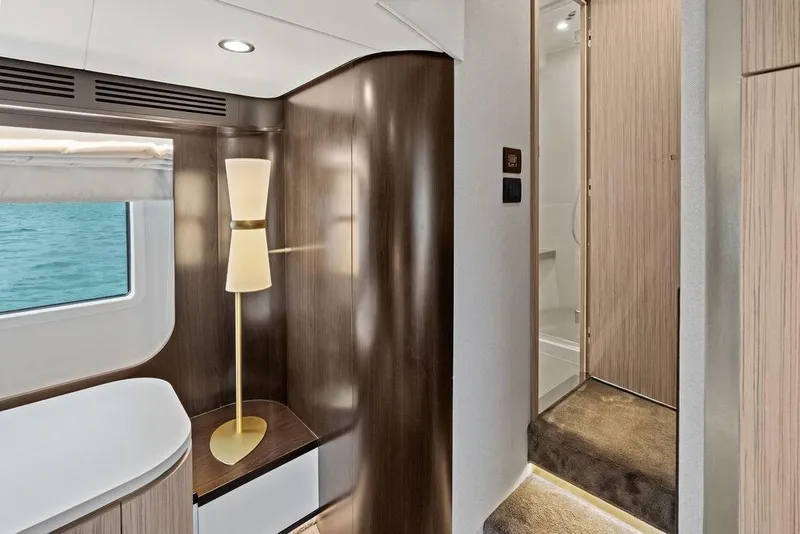 Slide: The Image of Luxurious interior of a 2019 Azimut yacht with modern design and elegant lighting. - 32