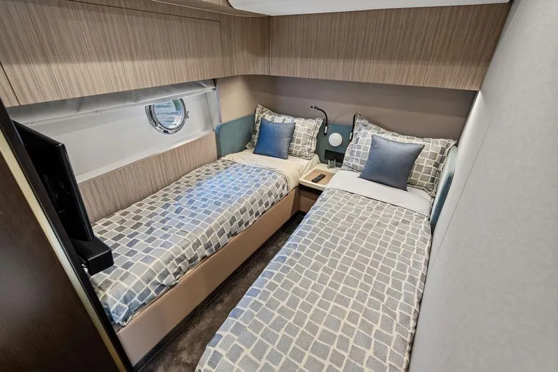 Slide: The Image of Luxurious 2019 Azimut yacht cabin with twin beds and modern decor. - 40