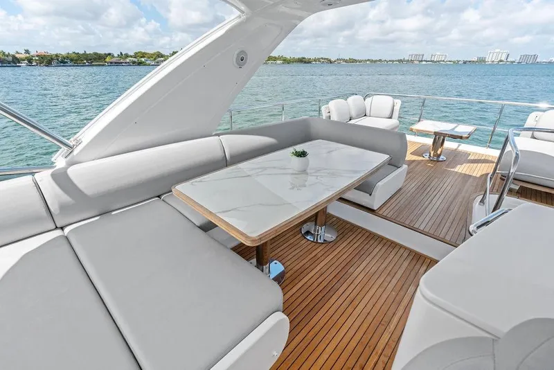 Slide: The Image of Luxurious 2019 Azimut yacht deck with elegant seating and ocean view. - 47