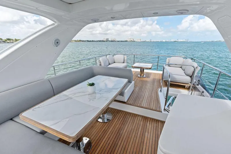 Slide: The Image of Luxurious 2019 Azimut yacht deck with elegant seating and ocean view. - 48