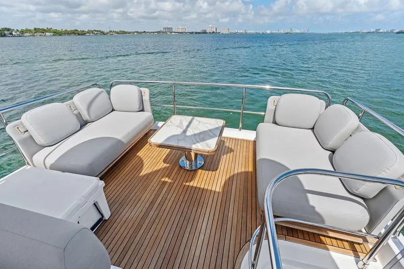 Slide: The Image of Luxurious 2019 Azimut yacht deck with comfortable seating and ocean view. - 50