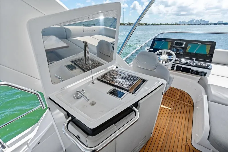 Slide: The Image of Luxurious 2019 Azimut yacht helm with modern controls and sleek design on open water. - 53