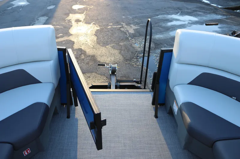 Slide: The Image of Interior view of 2026 SunChaser Geneva Fish 22 pontoon boat with seating and open gate. - 13