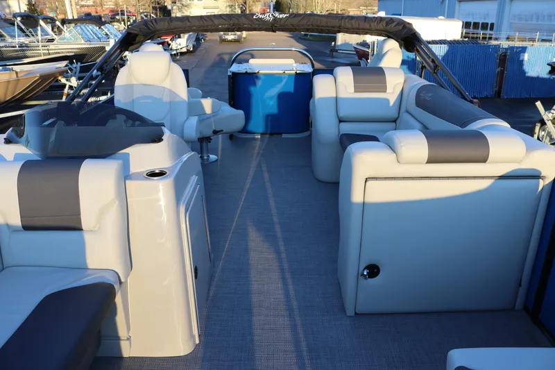 Slide: The Image of 2026 SunChaser Geneva Fish 22 pontoon boat interior with plush seating and modern design. - 14