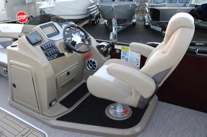 Slide: The Image of Captain's seat and helm of 2026 SunChaser Eclipse 23 SB DH boat. - 11