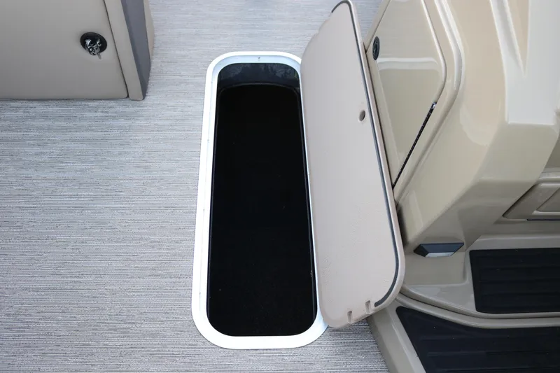 Slide: The Image of Open storage compartment on 2026 SunChaser Eclipse 23 SB DH boat deck. - 14